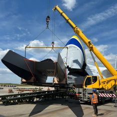 Unloading cargo from international cargo transporter